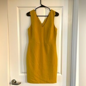 Banana Republic mustard sheath dress with v-neck detail. NWT. Size 6.